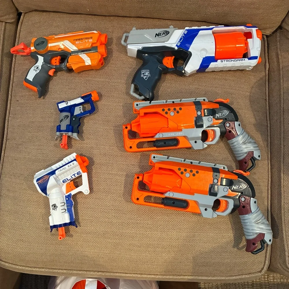 Nerf Arsenal, darts, goggles, mags, and multiple types of guns and attacments. - Picture 2 of 9